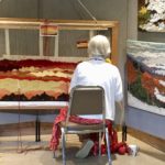 Sandy Adair at work on a tapestry